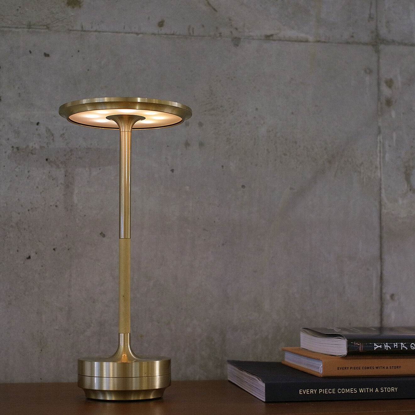 Aura Table Lamp silver metallic finish with modern sculptural silhouette