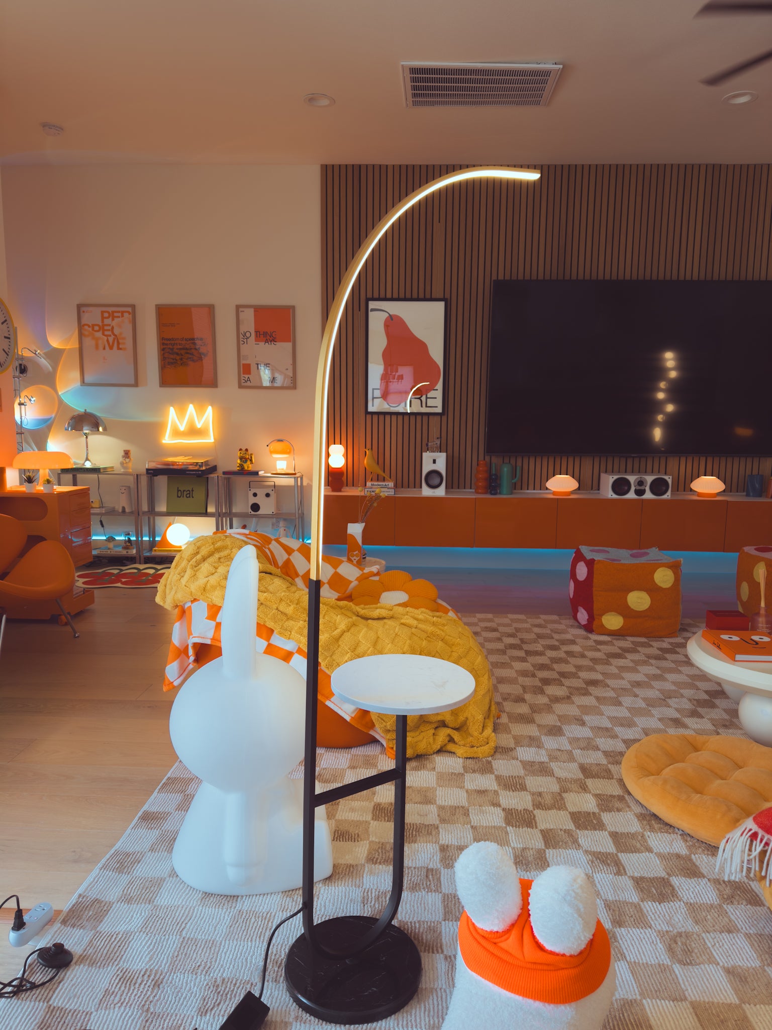 Crescenté Arc Floor Lamp lifestyle shot in open-concept living area