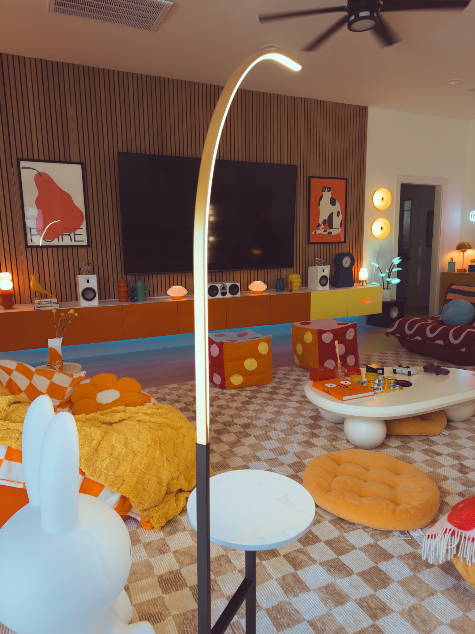 Crescenté Arc Floor Lamp in workspace casting focused reading light beam