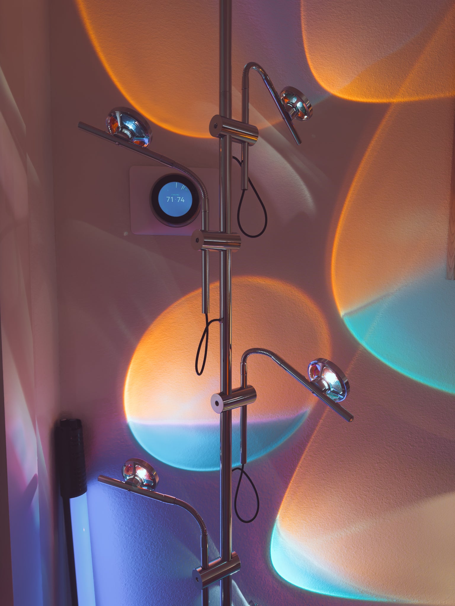 Polynescence Floor Lamp in contemporary living room with neutral palette