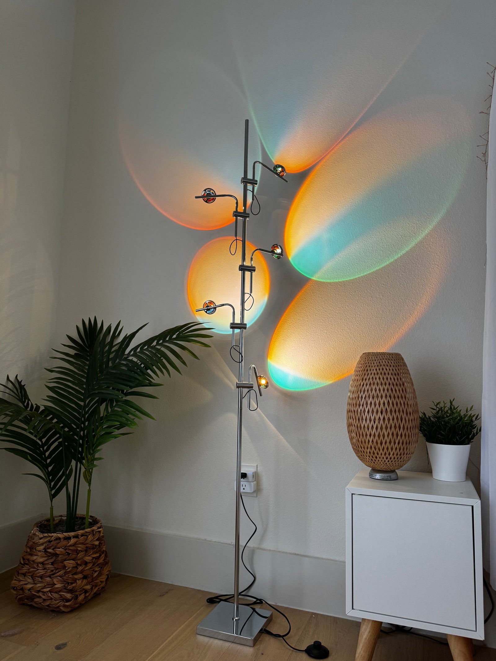 Polynescence Floor Lamp fully extended arms in open-concept loft space