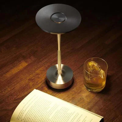 Aura Table Lamp on dining table casting warm dimmable ambient light