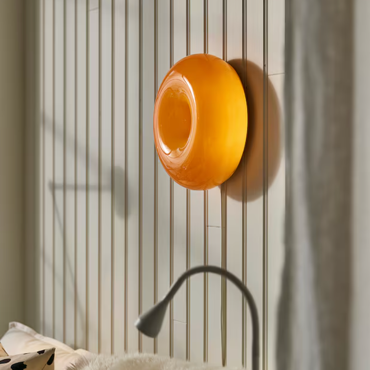 Glownut Lamp orange glowing warm amber in dim evening interior