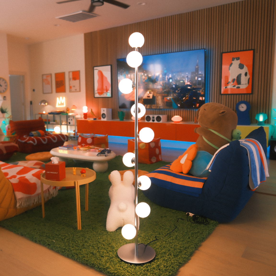 Pearl Lamp La Caza Lamp Modern living room with colorful furniture and decorative elements.