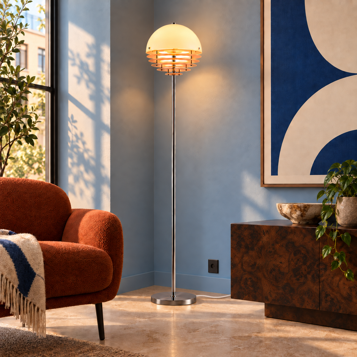 Aperol floor lamp in a blue room with russet seating, with a discreet white woven cord resting on the floor and disappearing behind the burl-wood cabinet.