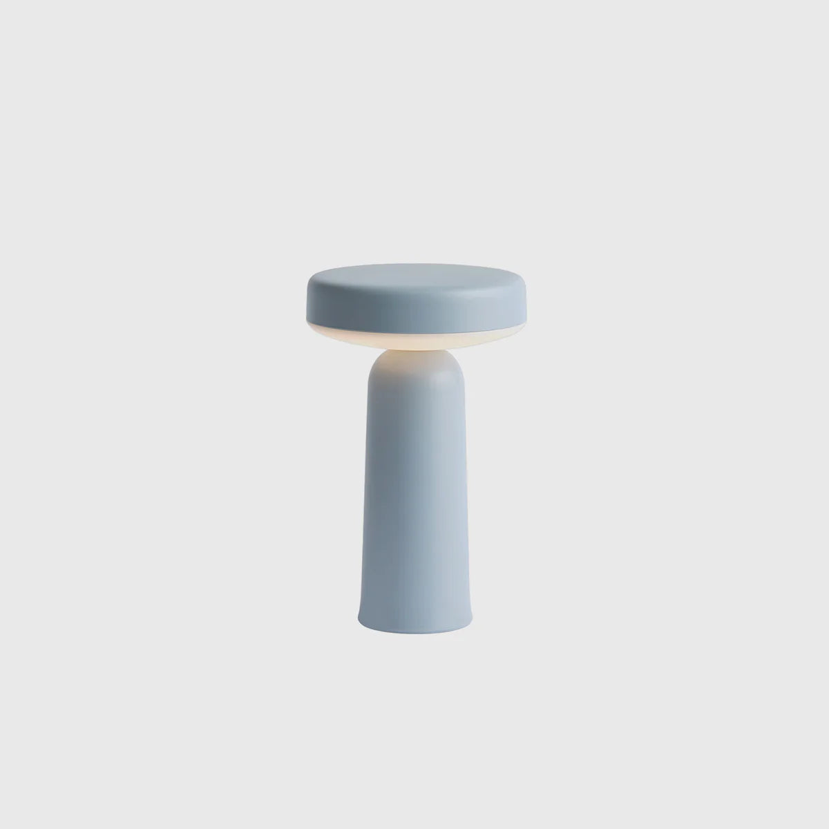 Pebble Table Lamp warm glow in dim bedroom with soft ambient light