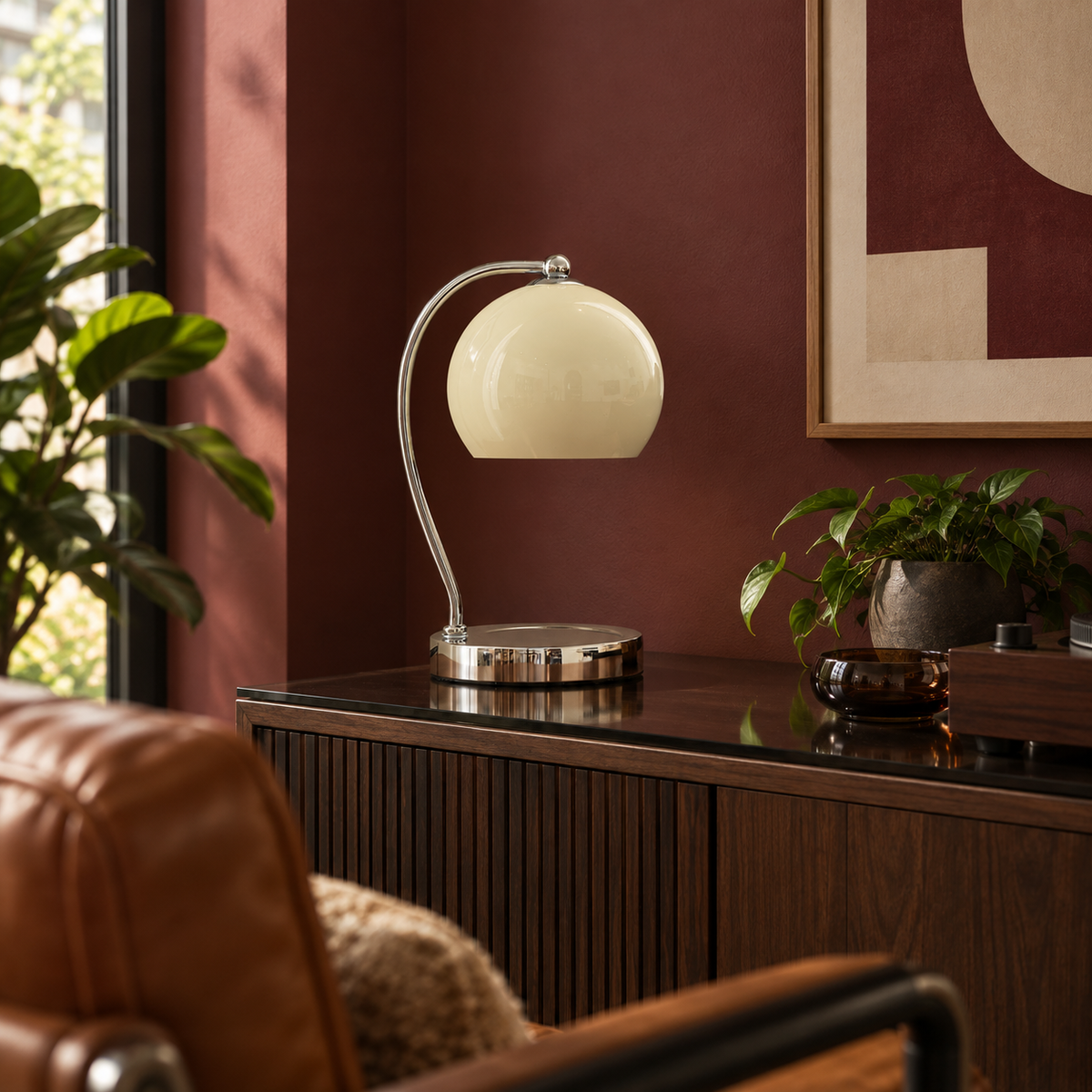 Wick table lamp in a bordeaux room with warm wood and caramel seating.