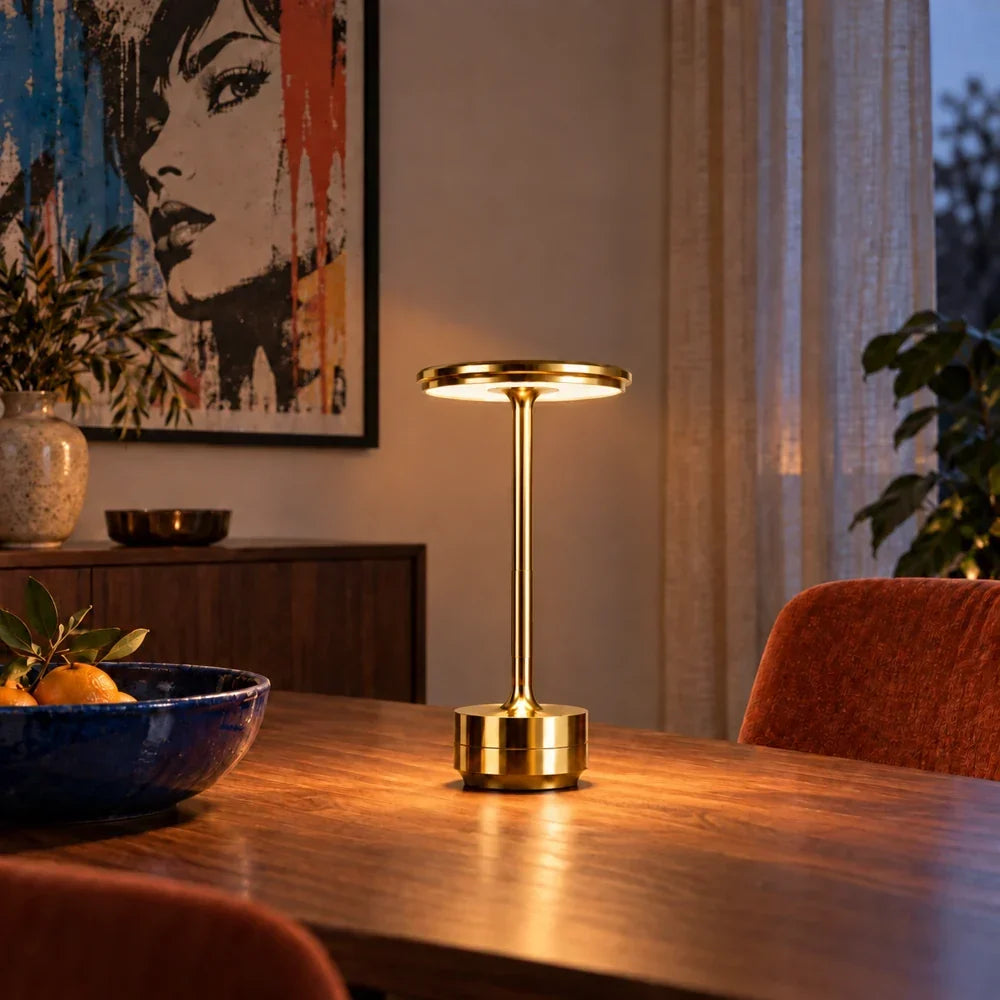 Aura cordless table lamp glowing on a side table