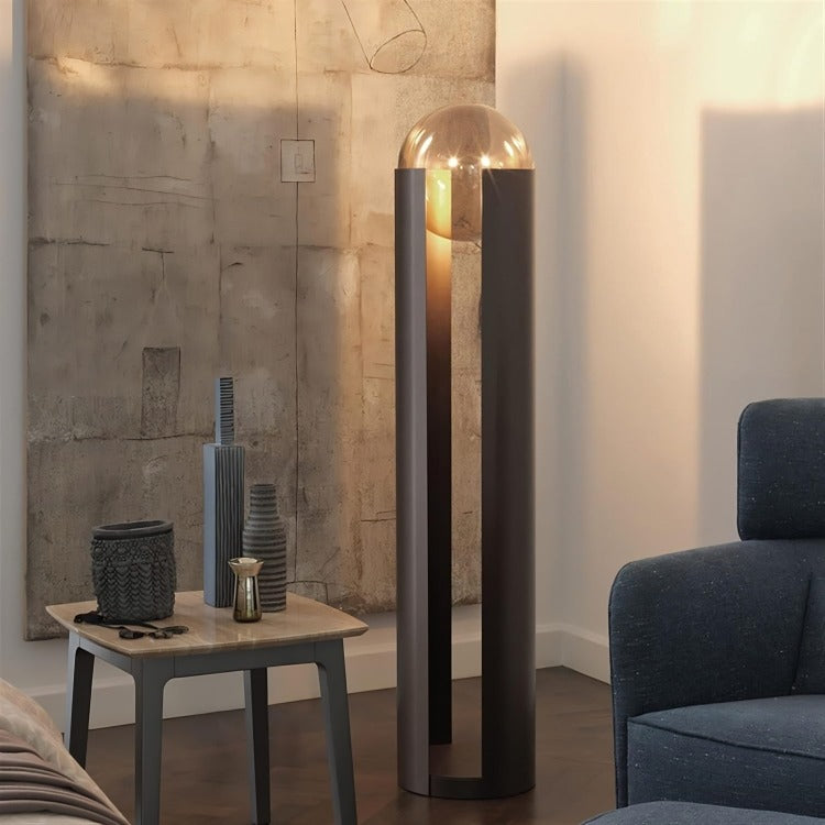 Amberlite Tower black tall sculptural tower floor lamp with warm amber glow by La Caza Cali