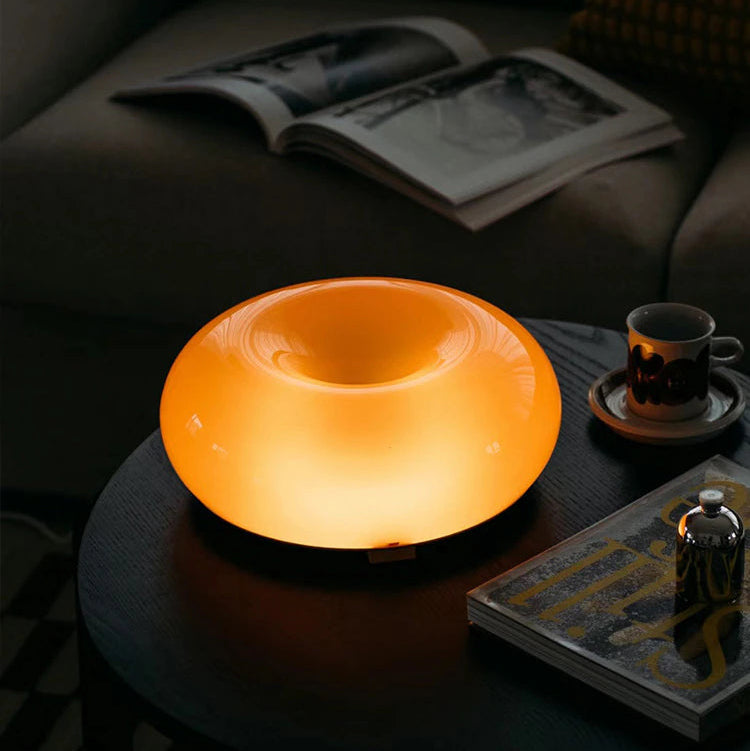 Glownut Lamp orange close-up with warm glow in studio lighting