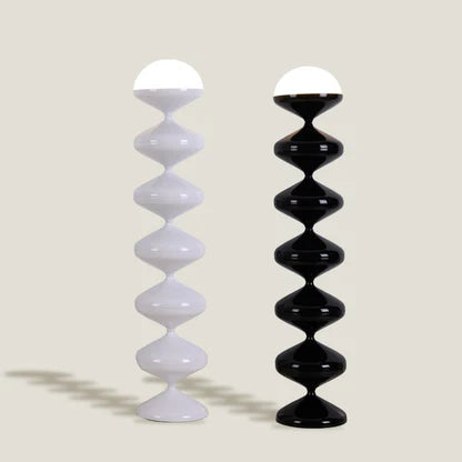 Pagoda Floor Lamp styled beside bookshelf in reading nook setting