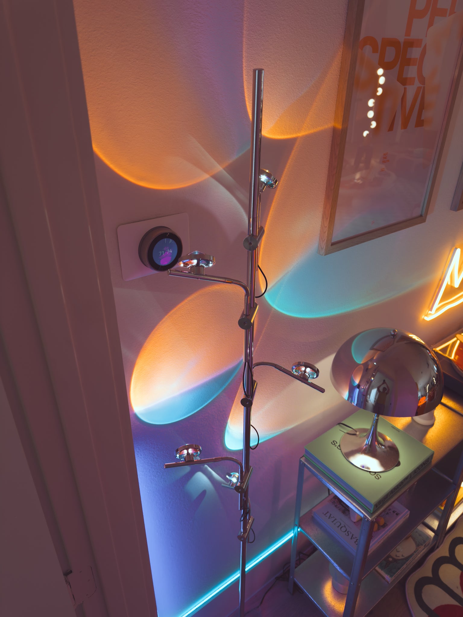Polynescence Floor Lamp close-up of chrome arm and LED light head