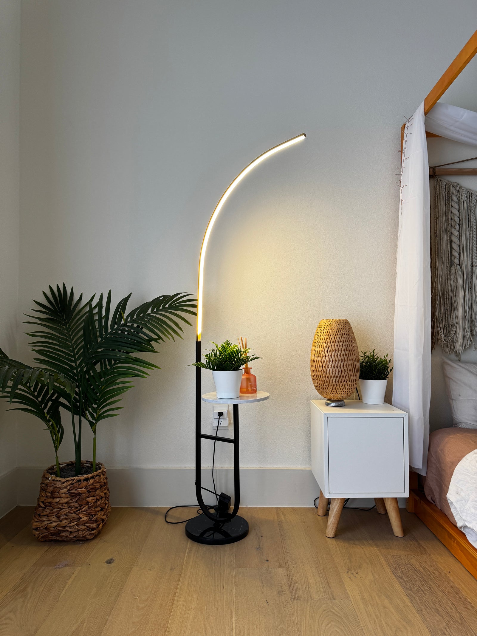 Crescenté Arc Floor Lamp in styled interior with natural daylight