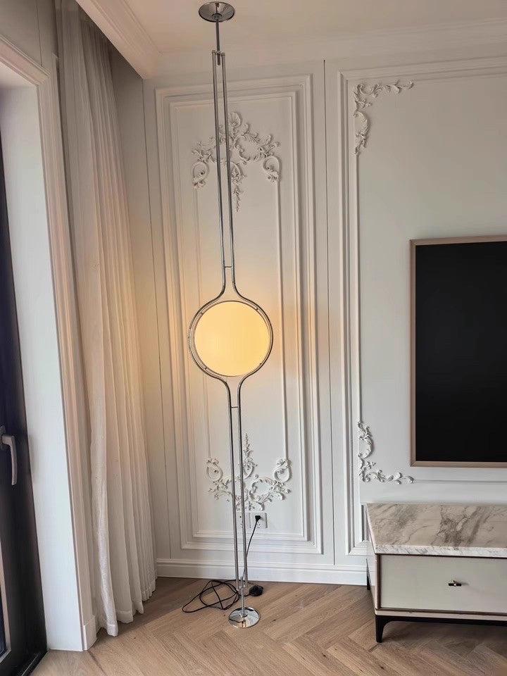 Pluto Floor To Ceiling Lamp alternate angle in open-concept interior