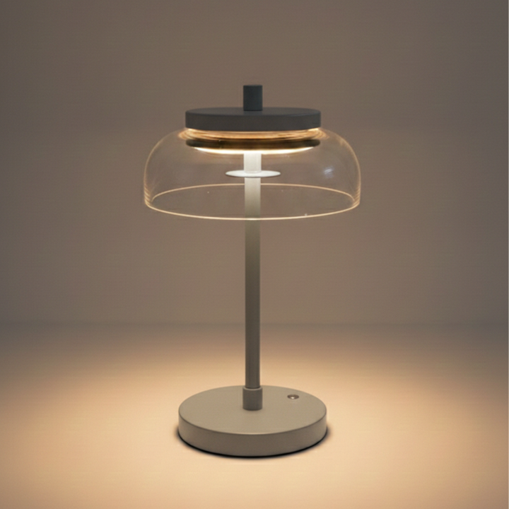Vinaura Table Lamp gold illuminated showing warm light diffusion