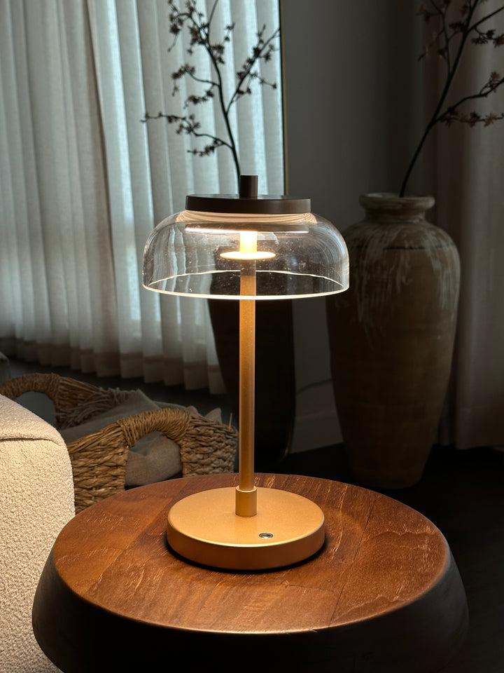 Vinaura Table Lamp lifestyle in curated homebody interior with warm tones