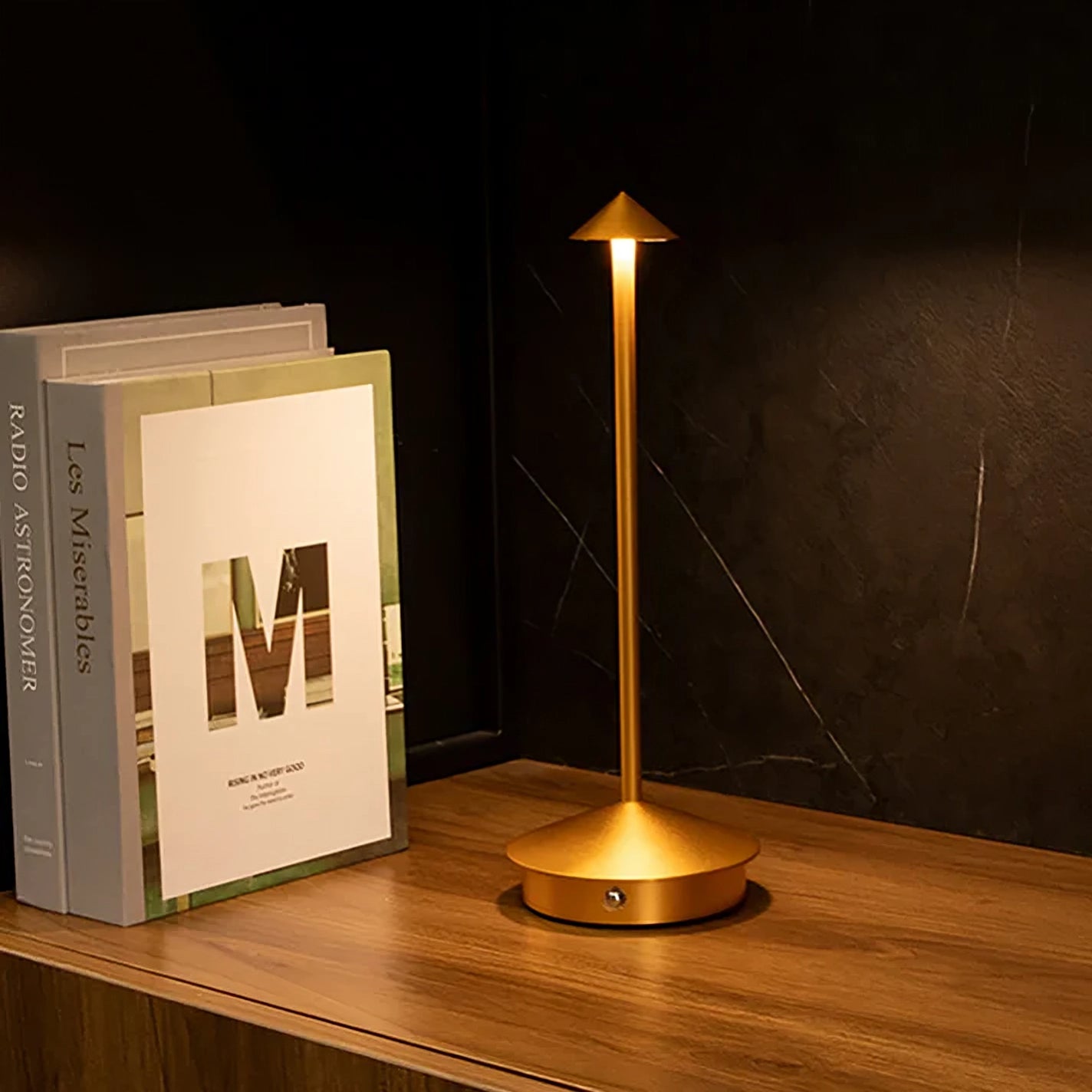 Pinnacle Table Lamp gold three-quarter view showing tapered cone silhouette
