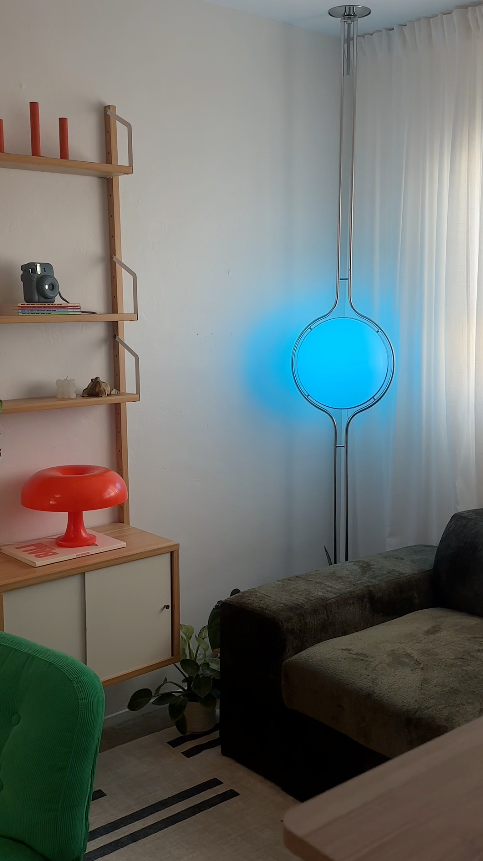 Pluto Floor To Ceiling Lamp daytime view with natural light in room