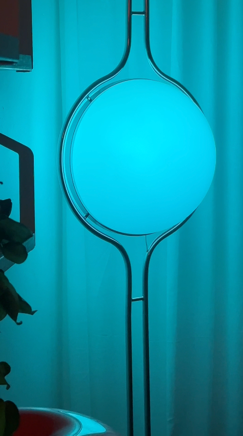 Pluto Floor To Ceiling Lamp close-up of upper globes near ceiling