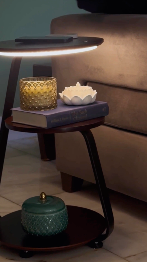 Glownest Bedside Table styled in modern bedroom beside bed with lamp