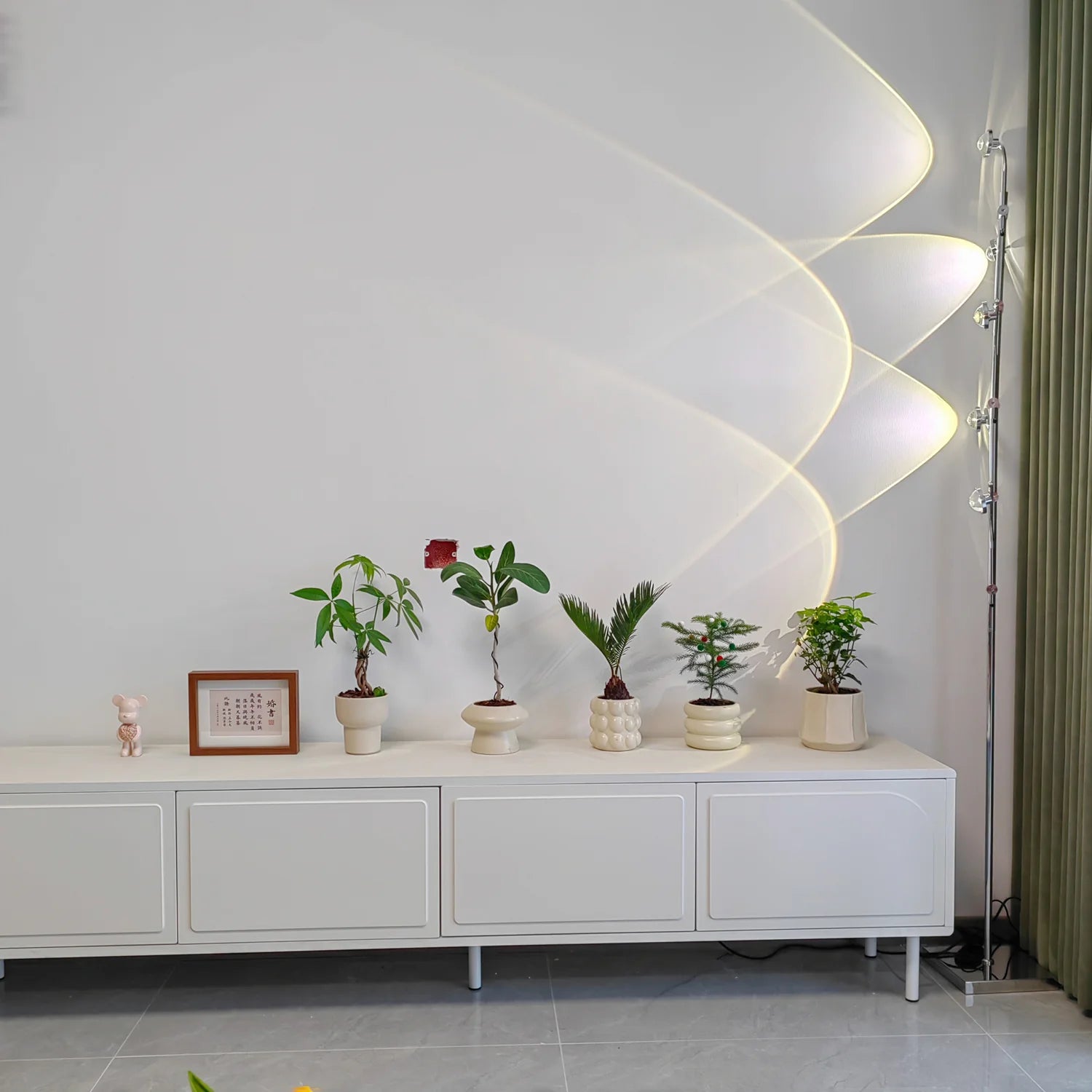 Polynescence Floor Lamp in designer showroom with modern furniture