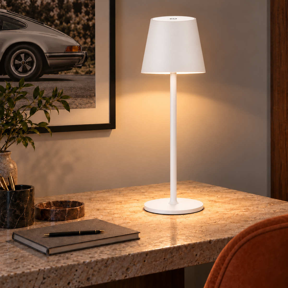 Lampette Table Lamp — illuminated in a styled room
