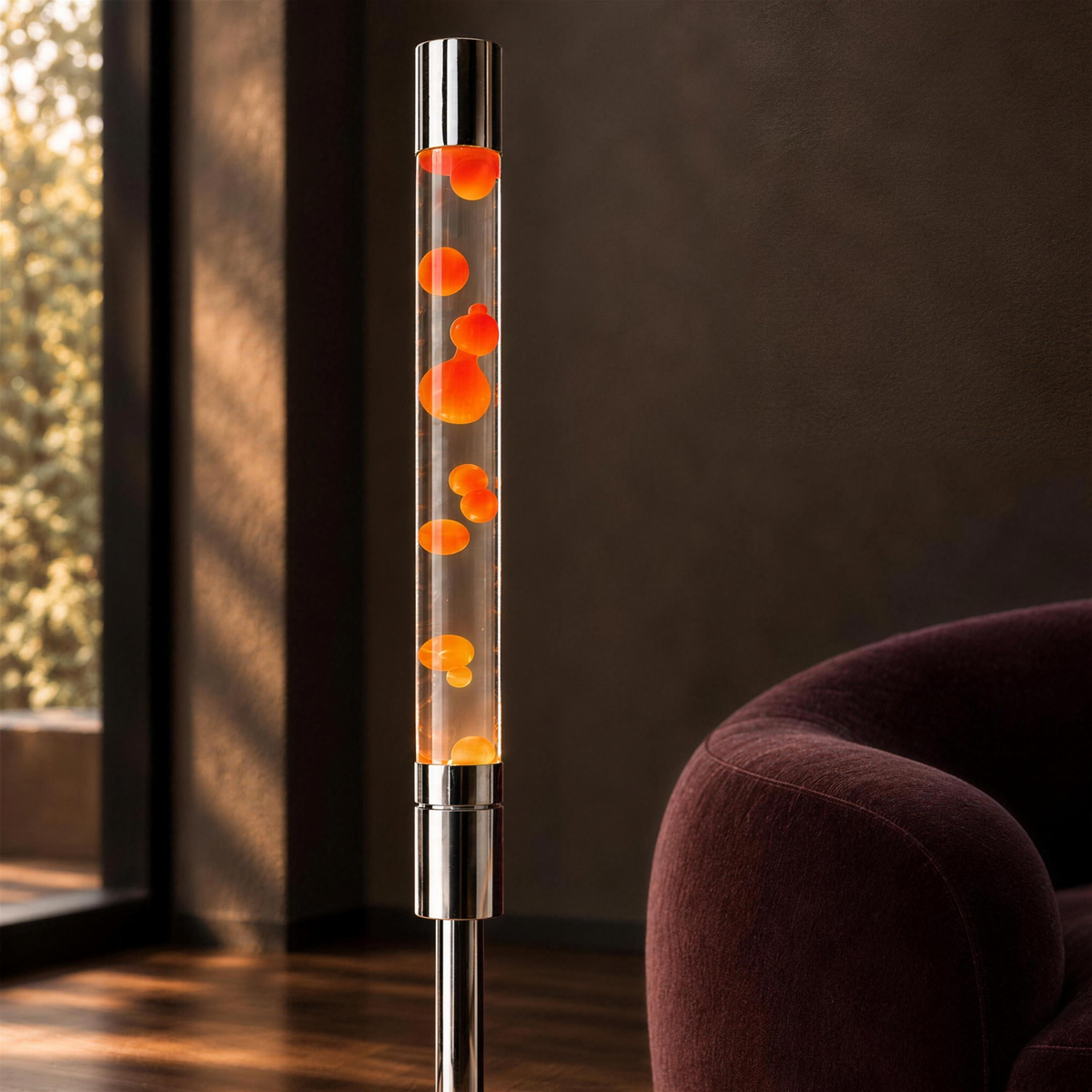 Close-up of the Molten Floor Lamp's glowing orange wax in clear liquid and polished silver details, styled in a dark modern lounge.