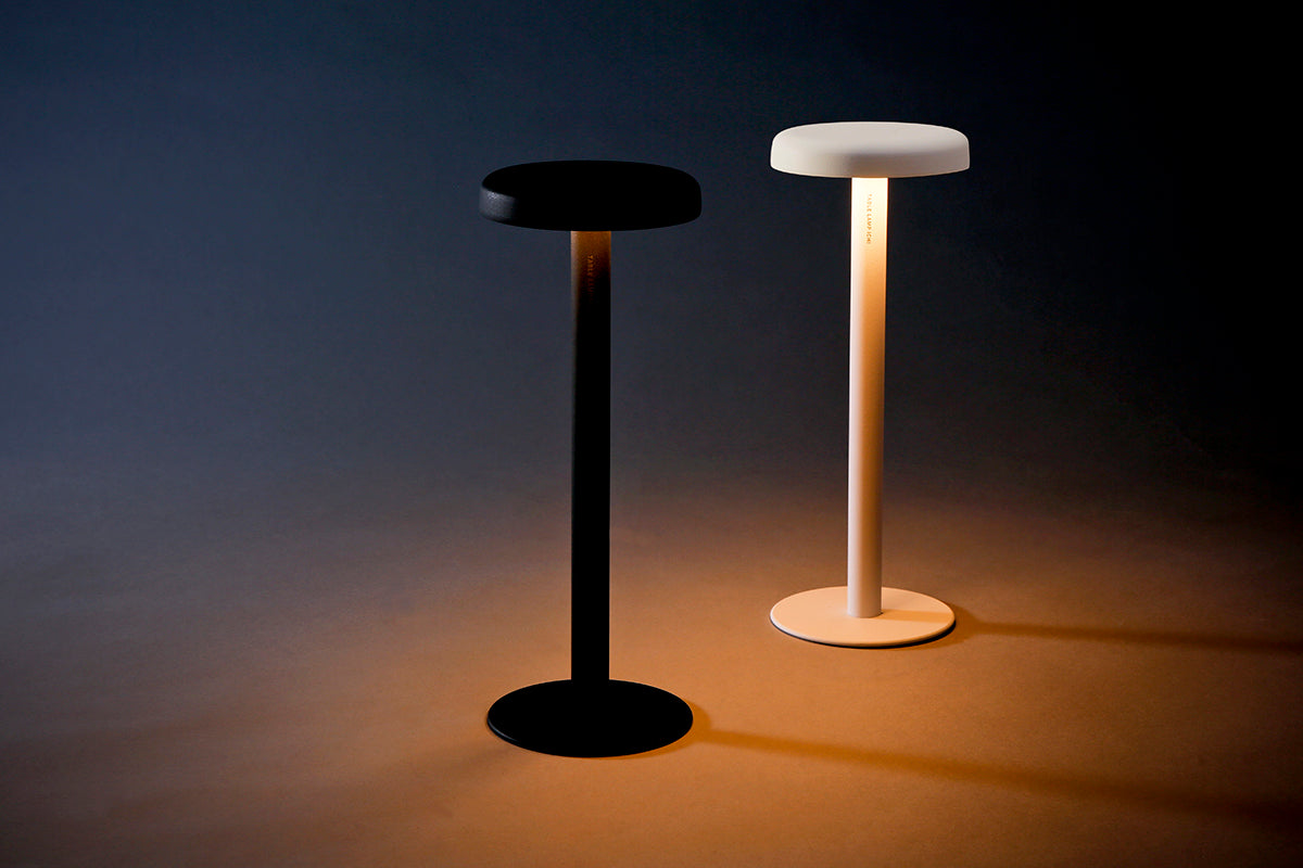 Nova Table Lamp illuminated with warm LED glow in dark room setting