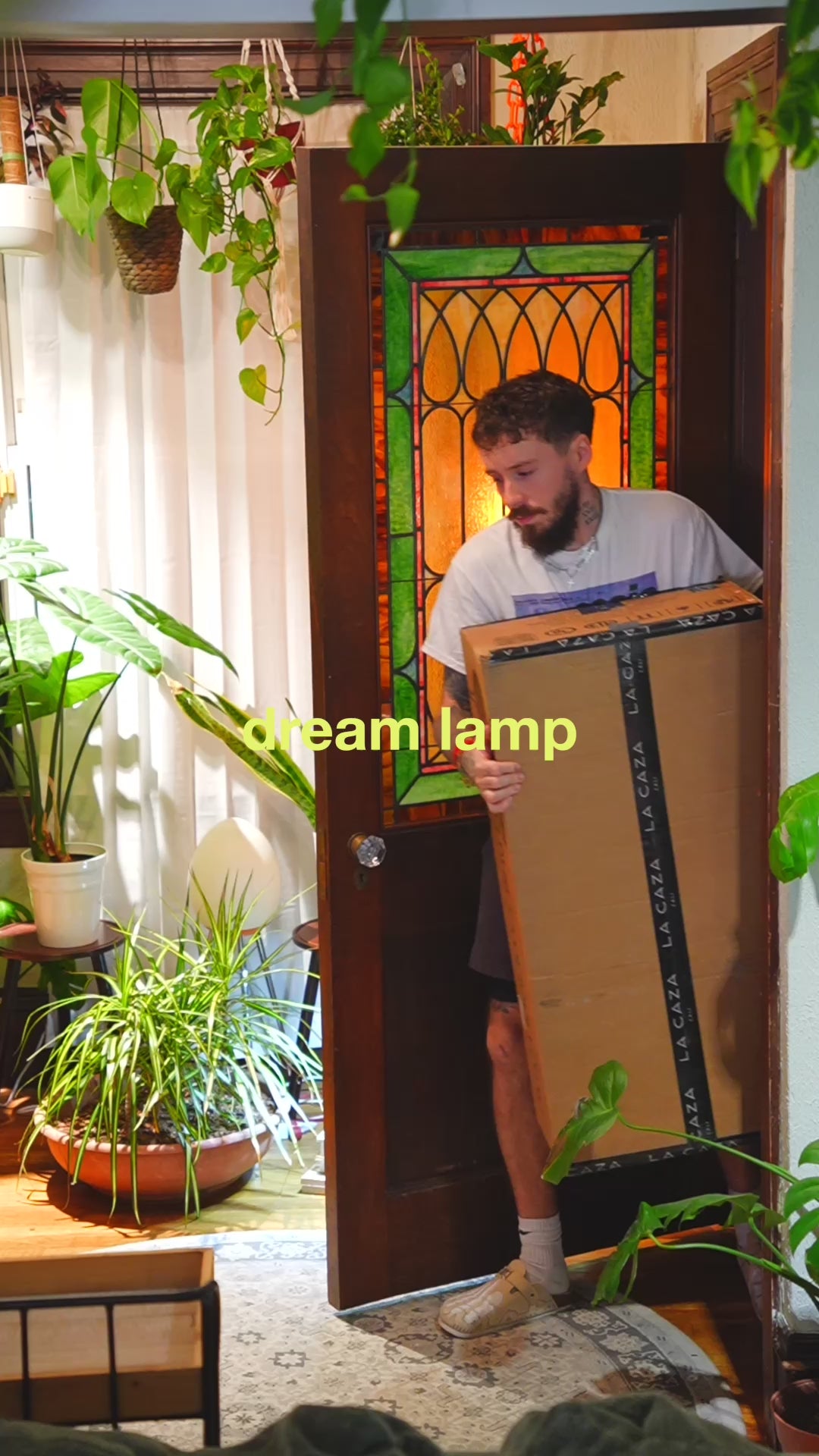 Video of Pluto Floor To Ceiling Lamp showing height adjustment and ambient glow