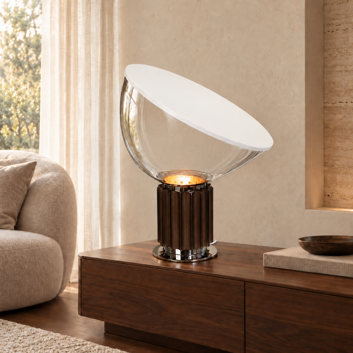 Projekt table lamp with a clear glass bowl and discreet white woven cord on a walnut console beside cream seating.